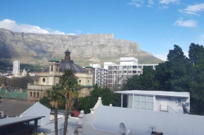 Bright, light, central. Views of Table Mountain.